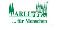 Der Slogan "Marli für Menschen" mit der historischen Häuserfront von Lübeck